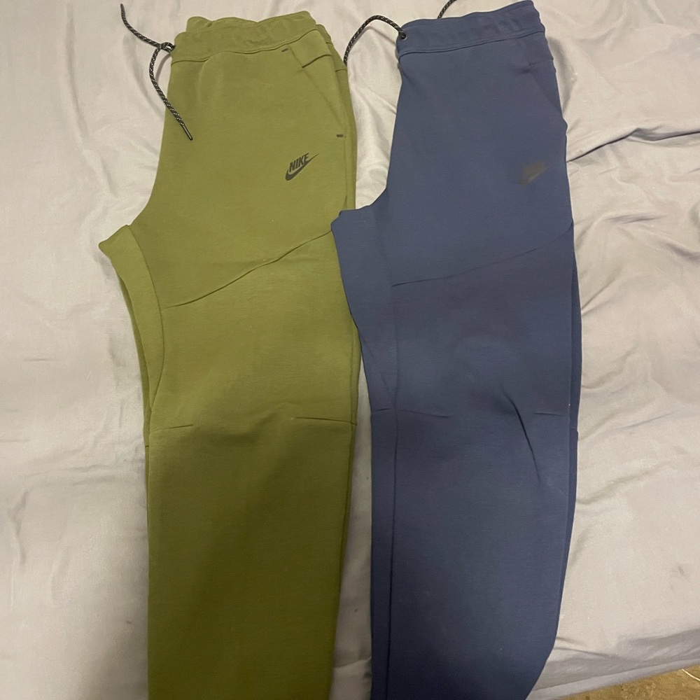 Three pair of Nike tech still new only tried on size M